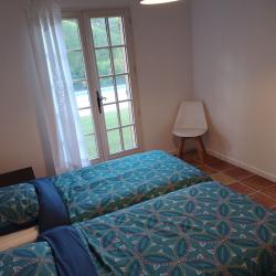 Tweede slaapkamer aan de kant van het zwembad
